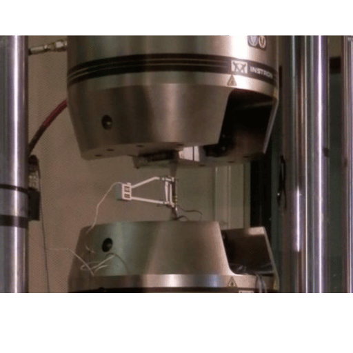 Coupon in INSTRON tensile testing machine.